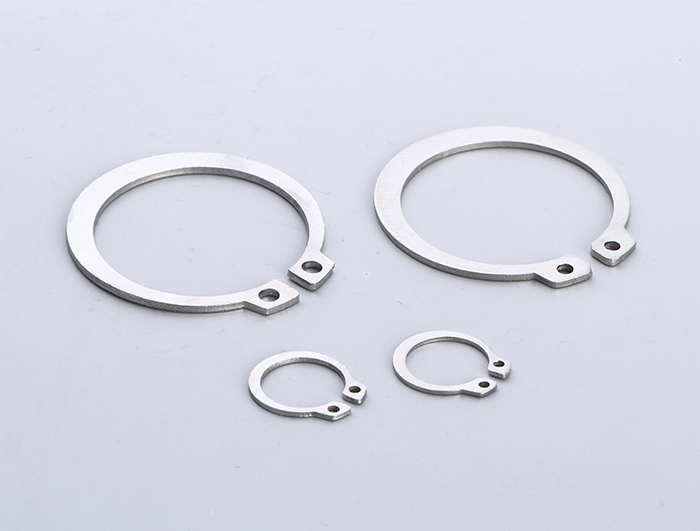 Shaft with retaining ring